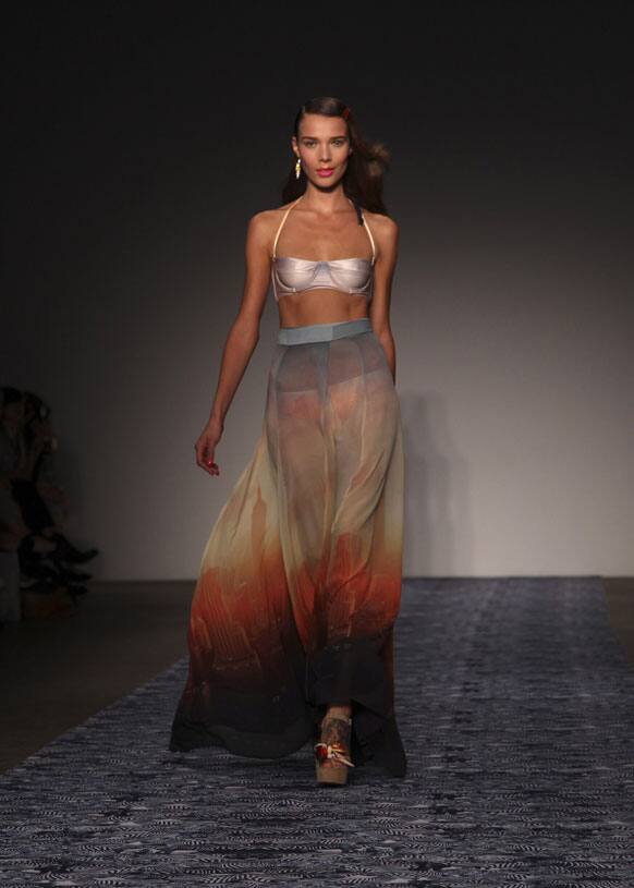 A model wearing a design from We Are Handsome struts along the runway during Australian Fashion Week in Sydney.