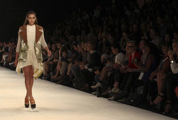 A model struts along the runway wearing a design by Kaylene Milner during Australian Fashion Week in Sydney.