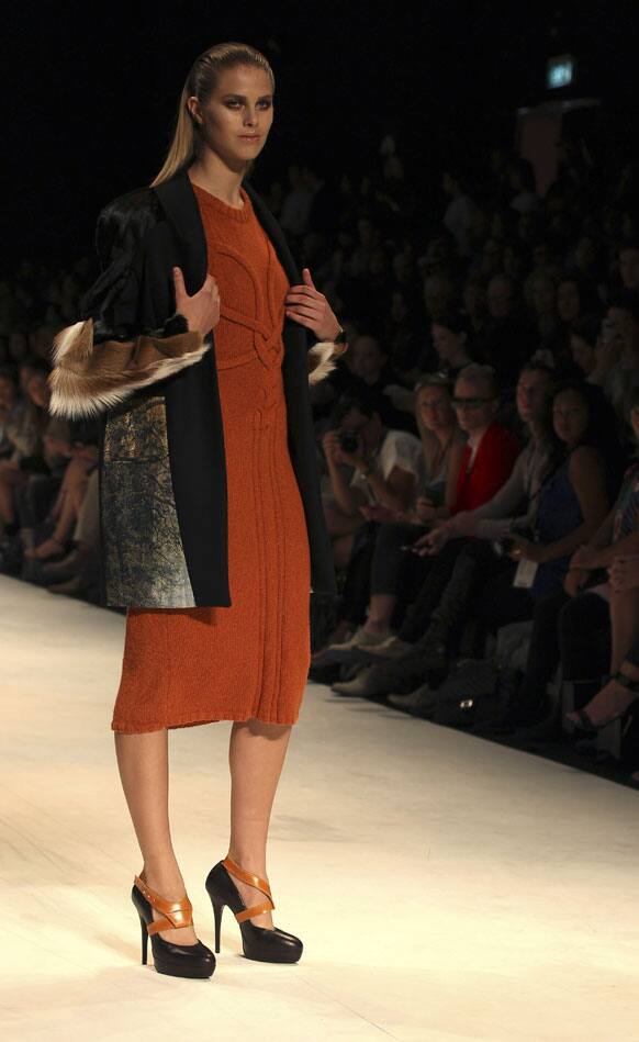 A model struts along the runway wearing a design by Kaylene Milner during Australian Fashion Week in Sydney.