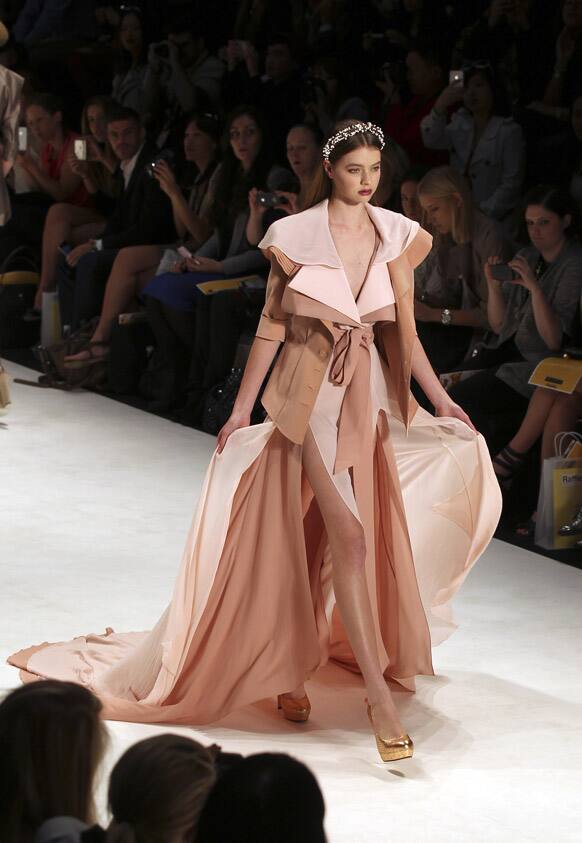 A model presents creations designed by South Korean Gabriel Lee during Australian Fashion Week in Sydney.