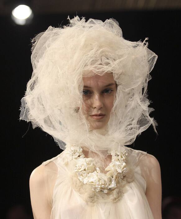 A model presents creations designed by Akira during Australian Fashion Week in Sydney.