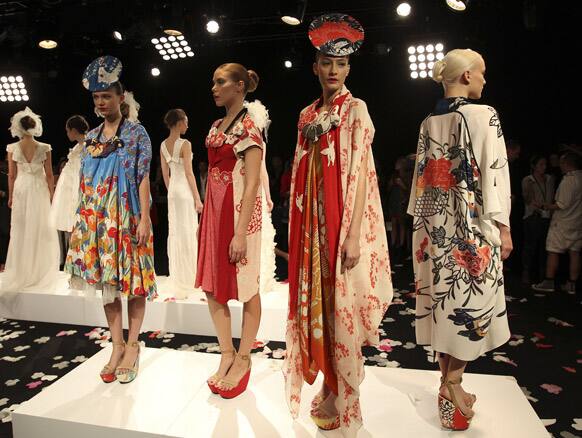 A model presents creations designed by Akira during Australian Fashion Week in Sydney.