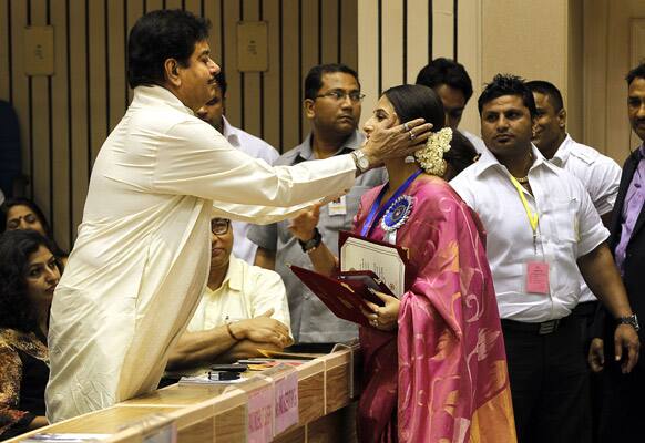 Shatrughan Sinha congratulates Vidya Balan after she received the Best Actress award for her film Dirty Picture during the 59th National Film Award 2011 in New Delhi.