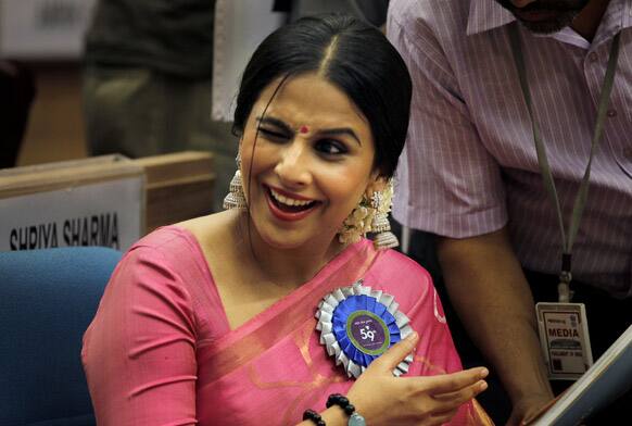 Vidya Balan winks to her fellow awardees during the 59th National Film Award 2011 in New Delhi. Balan received the Best Actress award for her film Dirty Picture.