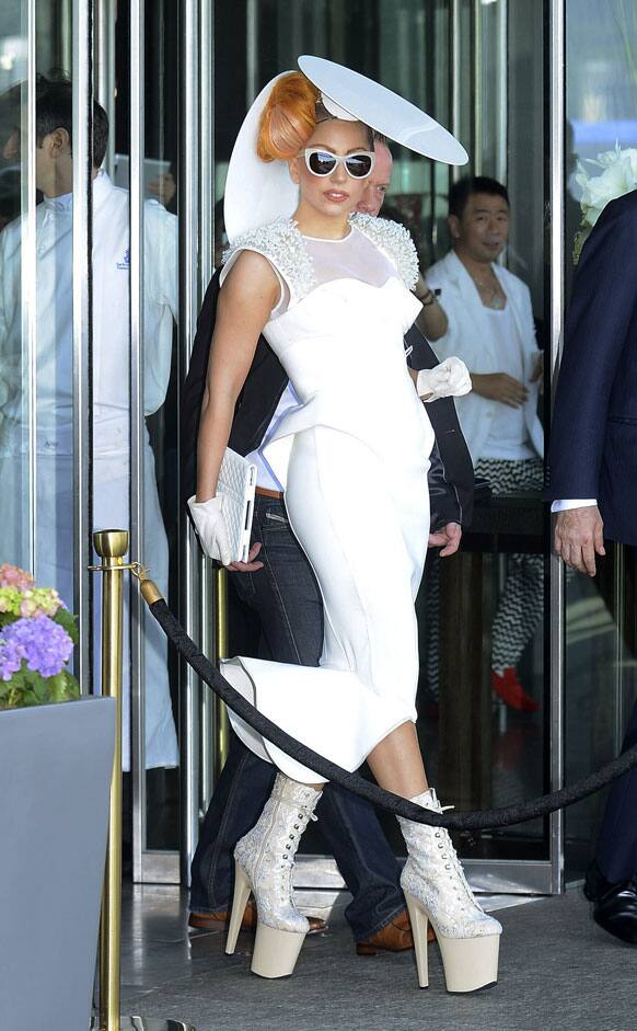 American pop singer Lady Gaga leaves a hotel in Hong Kong. Gaga, on her Asian tour, wrapped up concerts in Hong Kong Monday and will leave for Japan.