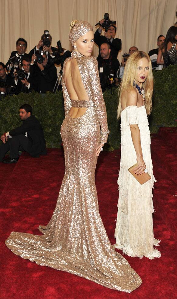 Karolina Kurkova, left, and Rachel Zoe arrive at the Metropolitan Museum of Art Costume Institute gala benefit, celebrating Elsa Schiaparelli and Miuccia Prada.