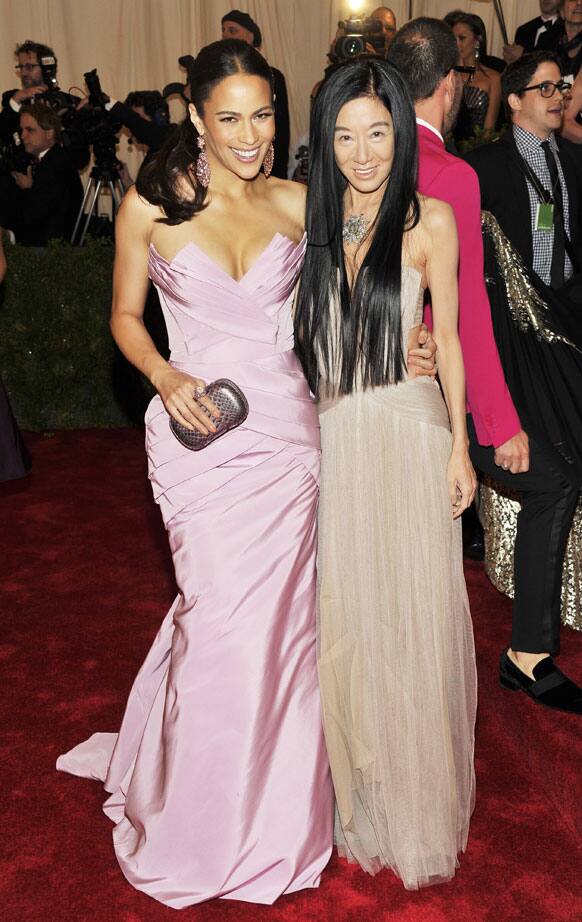 Paula Patton, left, and Vera Wang arrive at the Metropolitan Museum of Art Costume Institute gala benefit, celebrating Elsa Schiaparelli and Miuccia Prada.