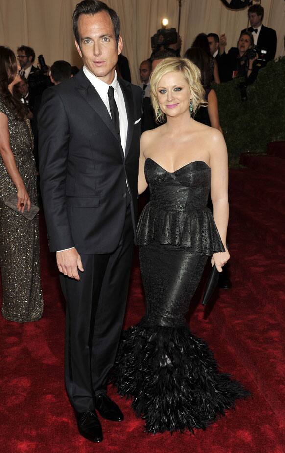 Will Arnett and Amy Poehler arrive at the Metropolitan Museum of Art Costume Institute gala benefit, celebrating Elsa Schiaparelli and Miuccia Prada.