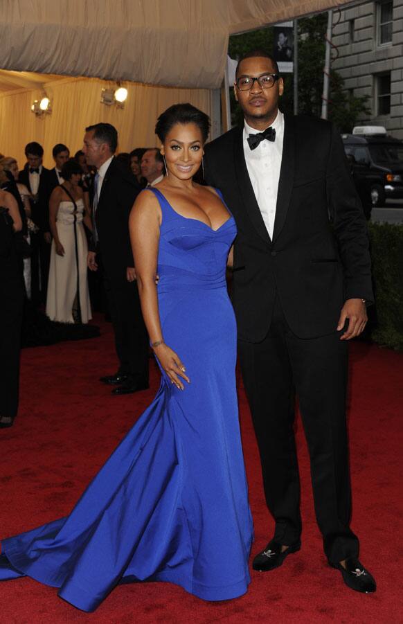 La La Anthony, left, and Carmelo Anthony arrive at the Metropolitan Museum of Art Costume Institute gala benefit, celebrating Elsa Schiaparelli and Miuccia Prada.