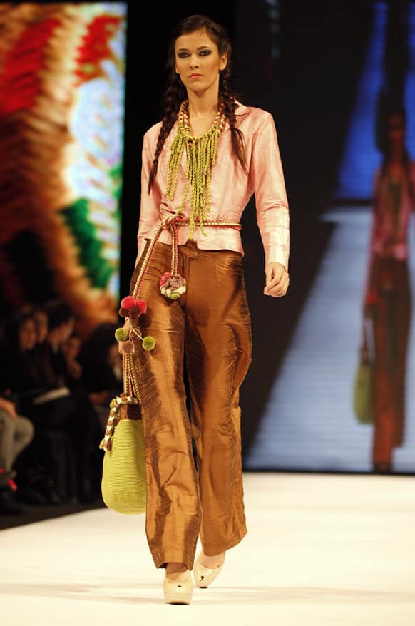 A model wears a creation by Colombia's designer Bertha Henriquez from her collection inspired by Wayuu Indian culture during the event 