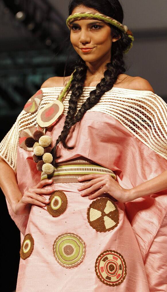 A model wears a creation by Colombia's designer Bertha Henriquez from her collection inspired by Wayuu Indian culture during the event 