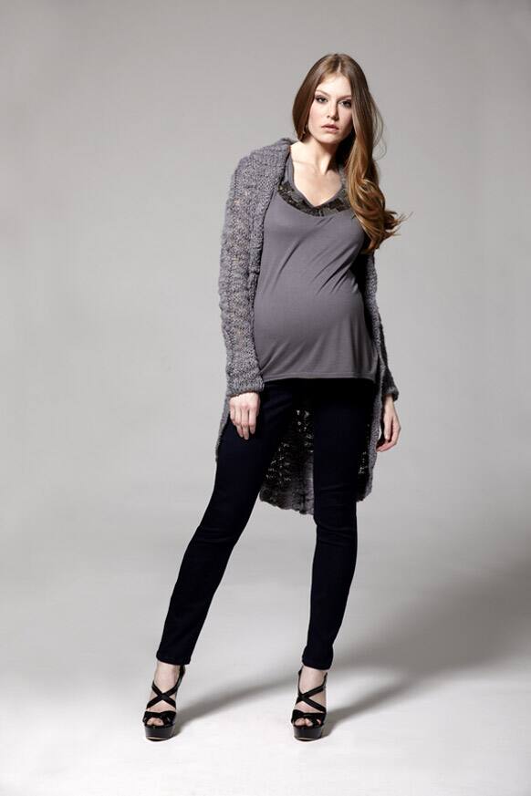 This undated photo provided by Destination Maternity shows an outfit from Jessica Simpson's maternity collection launching Fall 2012. Simpson, who gave birth to daughter Maxwell on May 1, 2012, announced Monday, May 14, that she is launching a new line of clothing for moms-to-be.