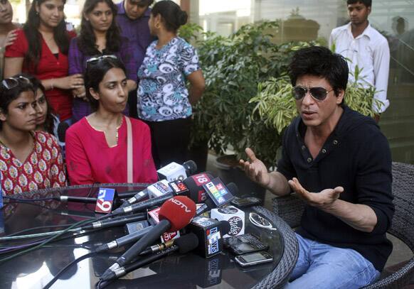 Shah Rukh Khan speaks to the media at his home in Mumbai,Khan faces a lifetime ban from Wankhede Stadium, Mumbai’s main cricket stadium, after an alleged scuffle with Maharashtra Cricket Association officials after the Indian Premier League cricket match Wednesday night, according to a news agency.