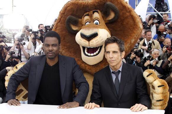 Actors Chris Rock, left, Ben Stiller, right and an actor dressed as a cartoon character, pose during a photo call for Madagascar 3: Europe's Most Wanted at the 65th international film festival, in Cannes.