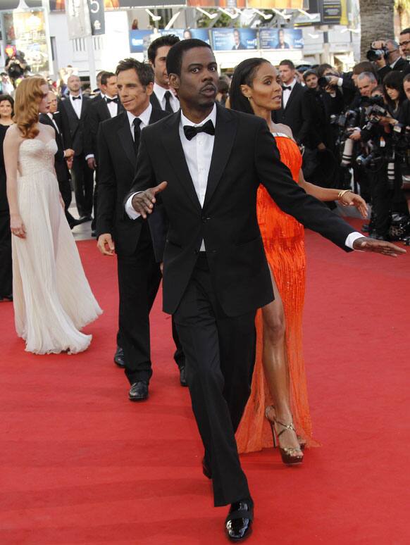 Actor Chris Rock dances as he arrives for the screening of Madagascar 3: Europe's Most Wanted, at the 65th international film festival, in Cannes.