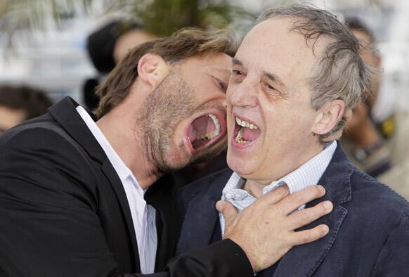 Actor Thomas Kretschmann, left and director Dario Argento interact during a photo call for Dario Argento Dracula at the 65th international film festival, in Cannes.