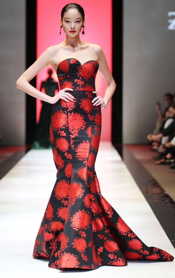 A model presents a creation at the Audi Fashion Festival Show of American fashion designer Zac Posen's Pre-Fall & F/W 2012 collection in Singapore. 