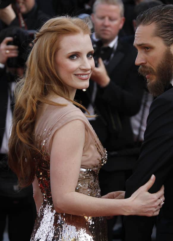 Actors Tom Hardy, right, and Jessica Chastain arrive for the screening of Lawless at the 65th international film festival, in Cannes.