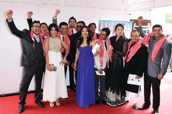 Anurag Kashyap's labour of love 'Gangs of Wasseypur' Part I and II was screened at the ferstival. The cast poses at the permiere of the film. The film has 370 actors playing varied roles. Manoj Bajpai, Nawazuddin, Reema Sen, Richa Chadda and Huma Qureshi play pivotal roles.