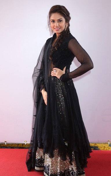 Indian actress Huma Qureshi poses during a photocall for the movie 'Gangs of Wasseypur' on the sidelines of the 65th Cannes film festival.