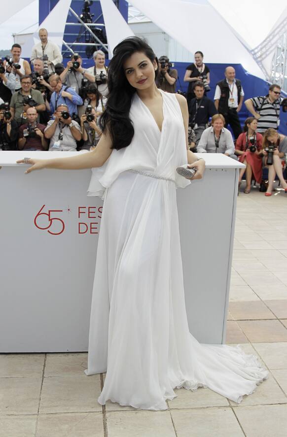 Niharika Singh poses during a photo call for Miss Lovely at the 65th international film festival, in Cannes.