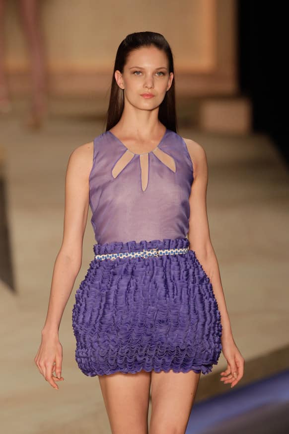 A model wears a creation from the Maria Bonita Extra summer collection during Fashion Rio in Rio de Janeiro, Brazil.