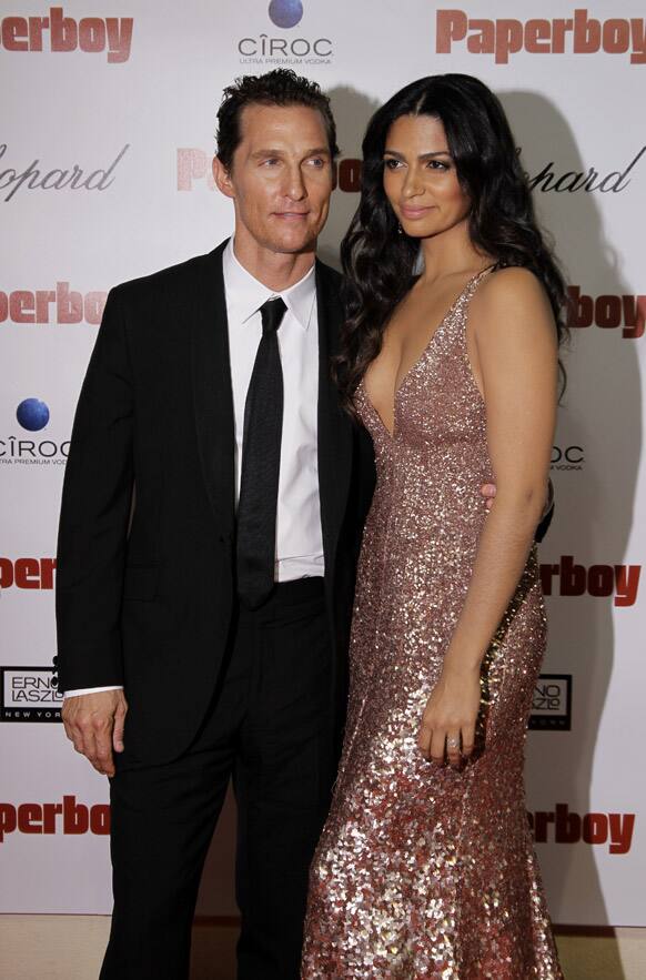 Actor Matthew McConaughey, left, and model Camila Alves arrive at the party for the paperboy at the 65th international film festival, in Cannes.