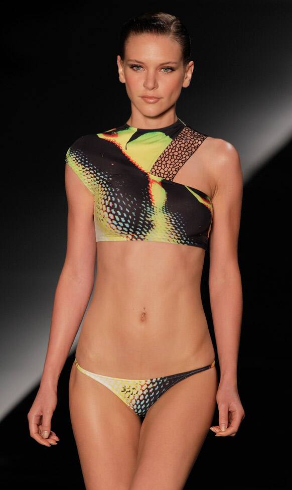 A model wears a two-piece swimsuit from the Lenny summer collection during Fashion Rio in Rio de Janeiro, Brazil.