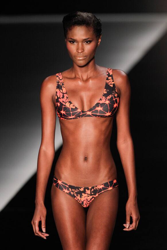 A model wears a two-piece swimsuit from the Lenny summer collection during Fashion Rio in Rio de Janeiro, Brazil.