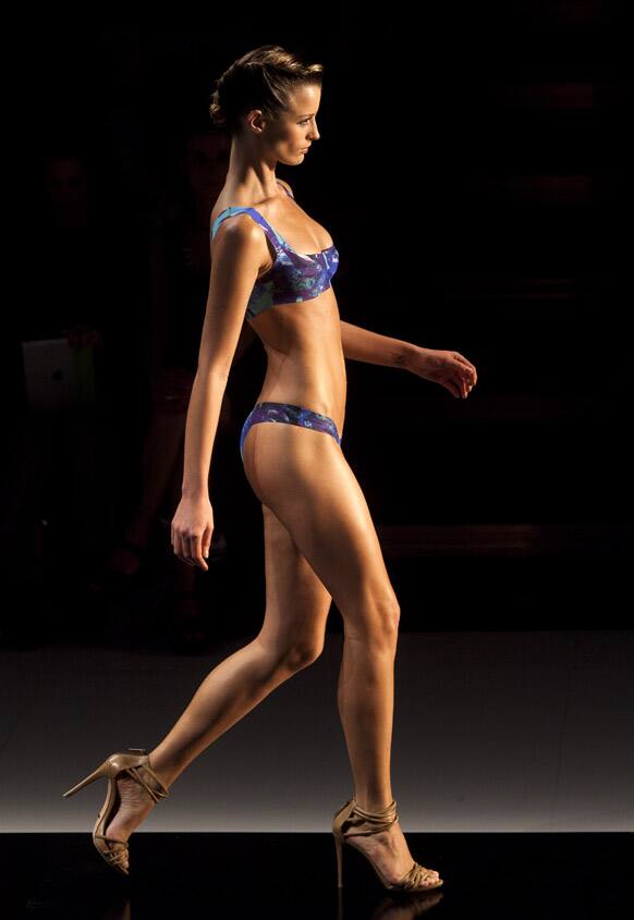 A model wears a two-piece swimsuit from the Lenny summer collection during Fashion Rio in Rio de Janeiro, Brazil.