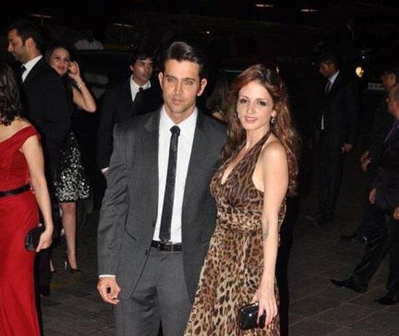 Super cute couple, Hrithik Roshan and Suzzane Roshan pose for the shutterbugs at KJo's party. 