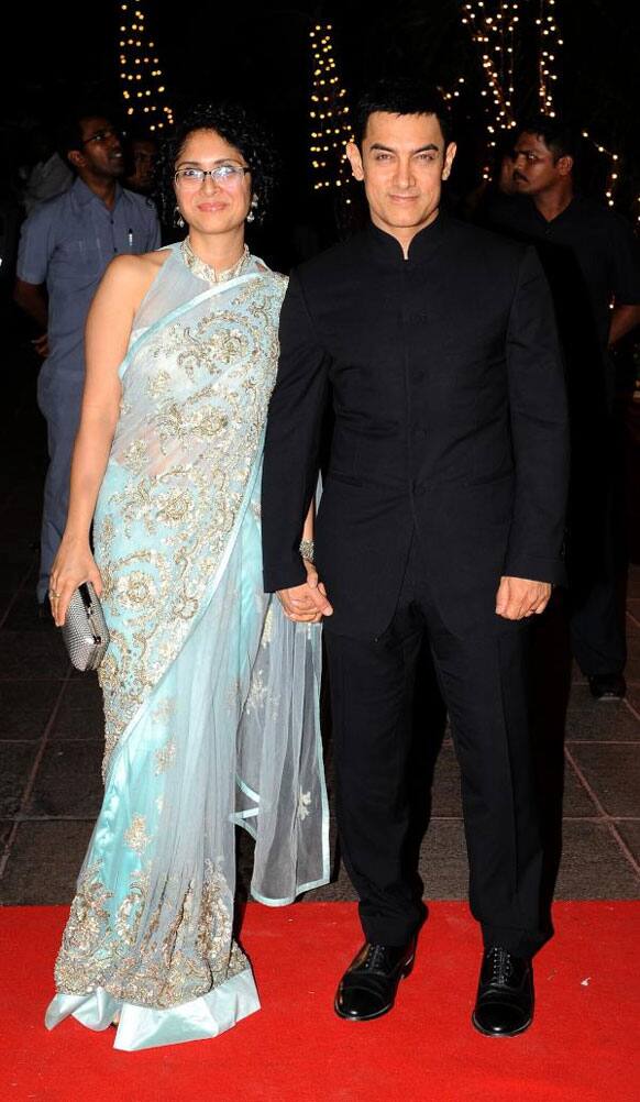 Aamir Khan wore a chinese collar suit and wife Kiran Rao chose an ice blue saree for the bash. 