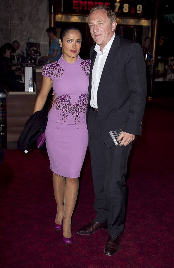 Actress Salma Hayek, left, and husband FranÃ§ois-Henri Pinault arrive at a central London cinema for the World Premiere of Prometheus.