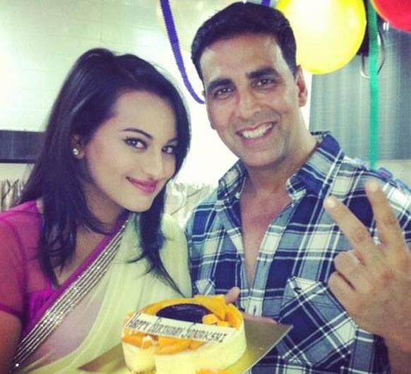 Sonakshi cuts her Birthday cake  especially brought by Akshay Kumar.