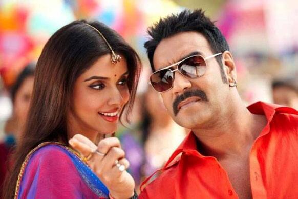 Asin and Ajay Devgn from a still from their upcoming film 'Bol Bachchan'. The film also stars Abhishek Bachchan and Prachi Desai. 