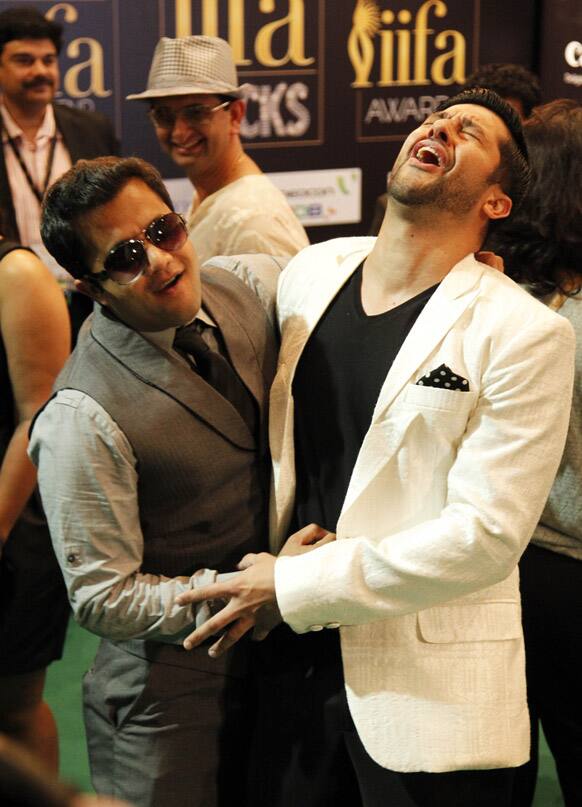 Omi Vaidya, left, Aftab Shivadasani, right, joke on the 