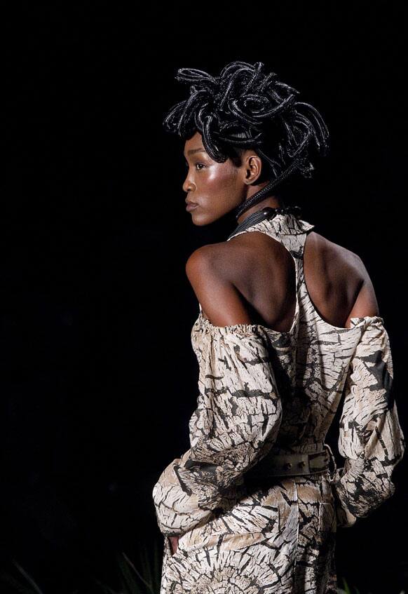 A model wears a creation from Ronaldo Fraga summer collection during the Sao Paulo Fashion Week.