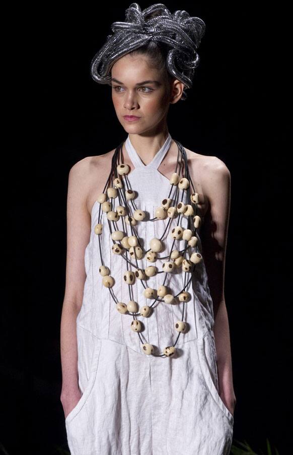 A model wears a creation from Ronaldo Fraga summer collection during the Sao Paulo Fashion Week.