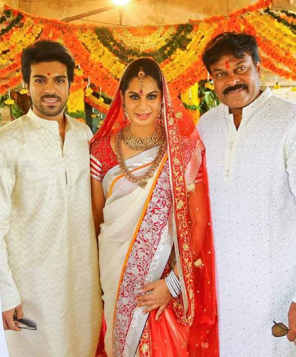 Ram Charan poses with his bride-to-be Upasana and his father superstar Chiranjeevi. The couple will be tying the knot on June 14. 