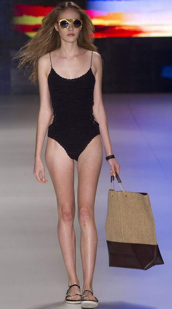 A model wears a creation from Osklen summer collection during the Sao Paulo Fashion Week in Sao Paulo.