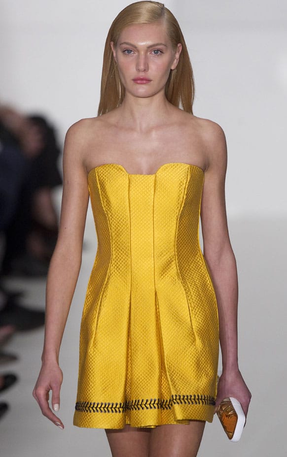 A model wears a creation from Reinaldo Lourenco summer collection during the Sao Paulo Fashion Week in Sao Paulo.