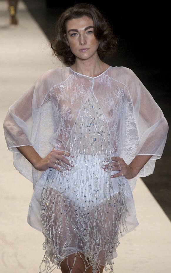 A model wears a creation from the R.Rosner summer collection during a Sao Paulo Fashion Week event in Sao Paulo.