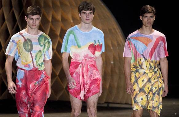 Models wear creations from the Amapo summer collection during Sao Paulo Fashion Week.