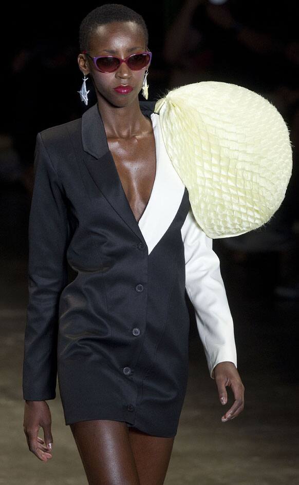 A model wears a creation from the Amapo summer collection during Sao Paulo Fashion Week.