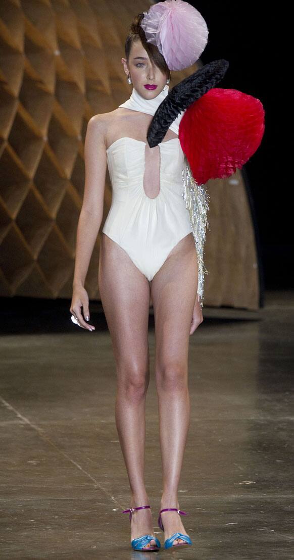 A model wears a creation from the Amapo summer collection during Sao Paulo Fashion Week.