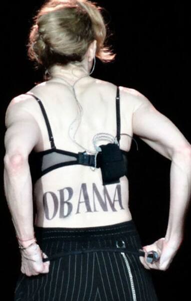 Madonna shows off her new 'Obama' tattoo at Yankee Stadium on September 7 as Barack Obama delivered his nomination acceptance speech at the Democratic National Convention in Charlotte, North Carolina.