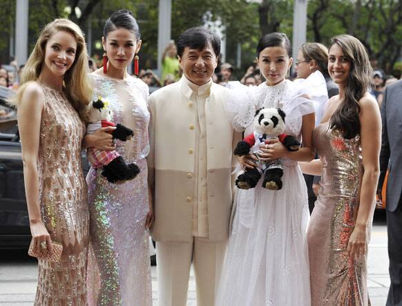 Actors, from left, Laura Weissbecker, Zhang Lanxin, Jackie Chan, Yao Xingtong, and Caitlin Dechelle arrive at 