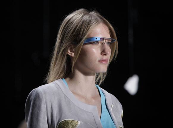 A model wearing Google Glass participates in a run through before the Diane Von Furstenberg Spring 2013 collection is modeled during Fashion Week in New York.