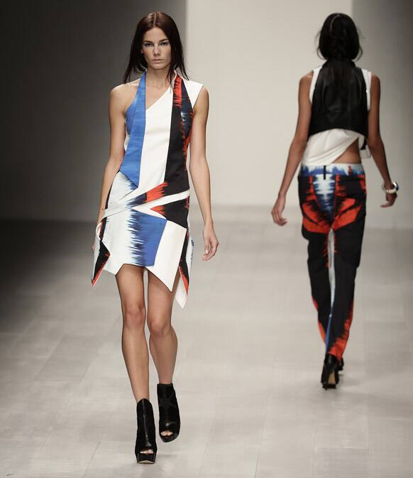 A model presents a design by Jean-Pierre Braganza during his Spring/Summer 2013 show at London Fashion Week in London.