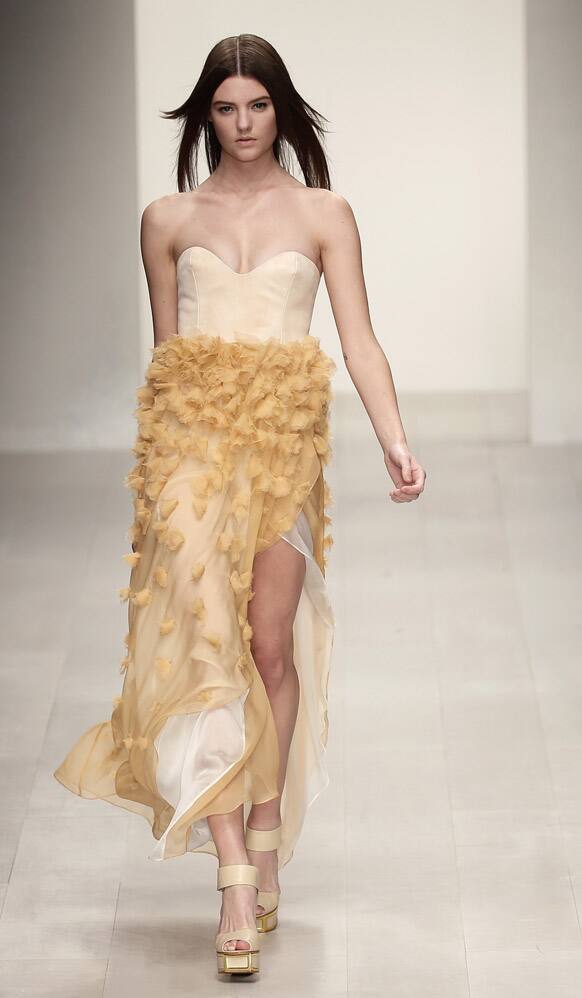 A model presents a design by Felder Felder during their Spring/Summer 2013 show at London Fashion Week in London.